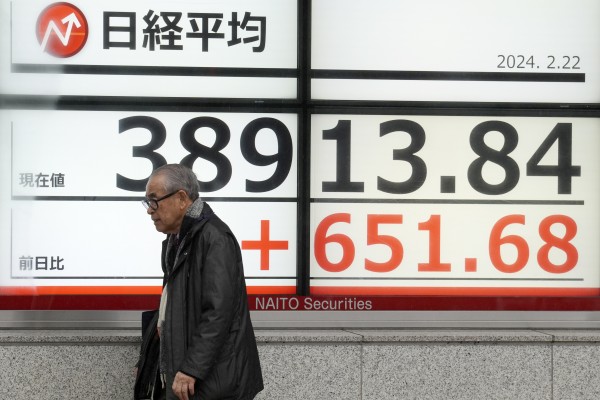 Stock market today: Japan's benchmark Nikkei 225 surges to all time high, near 39,000