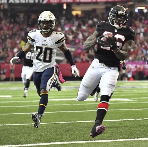 Falcons watch Chargers pull out OT win, 33-30