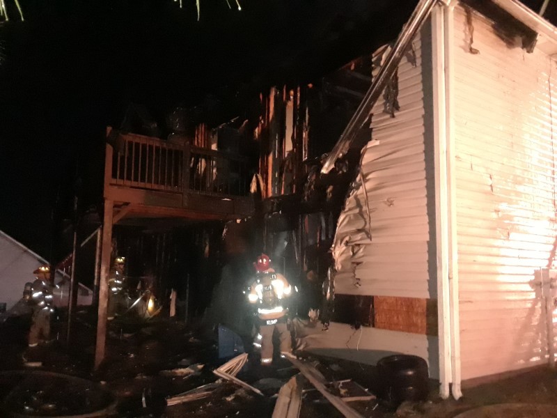 Eight people escape burning home in Lawrenceville | AccessWDUN.com