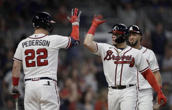 Braves, Brewers spurred to playoffs by bold midseason deals