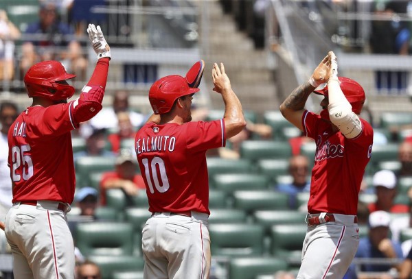 Naquin's two homers, Diaz's two-inning save lift Mets