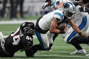 Robinson outshines top pick Young, Falcons beat Panthers