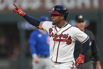 Braves clinch NL home-field with win over Cubs in 10 in